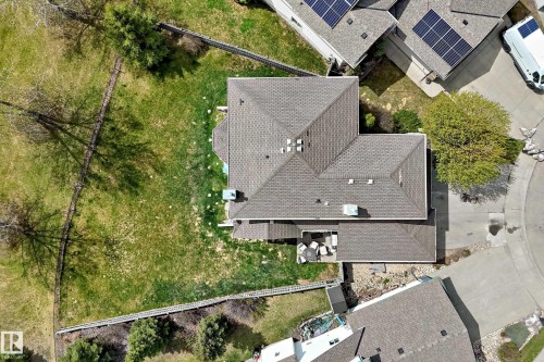 Asphalt shingle roofing with multiple peaks and valleys - 5107 200 Street, Edmonton, AB - Outdoor