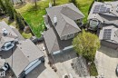 Two-story residence with a multi-gabled roofline, brick exterior, and a two-car garage - 5107 200 Street, Edmonton, AB  - Outdoor 