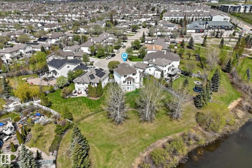 Two-story residence with a light-colored exterior and a multi-level rear yard - 5107 200 Street, Edmonton, AB - Outdoor With View