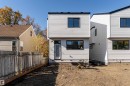 New construction exterior featuring horizontal siding and dark-trimmed windows - 12031 124 Street Nw, Edmonton, AB  - Outdoor With Exterior 
