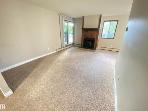 203 10826 113 Street, Edmonton, AB - Indoor With Fireplace