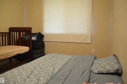 Image quality insufficient for description - 1412 152, Edmonton, AB - Indoor Photo Showing Bedroom