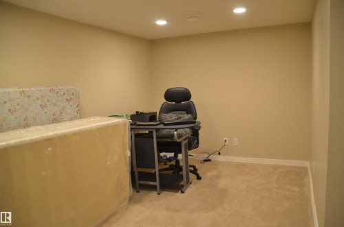 Carpeted room featuring recessed lighting, neutral wall paint, and white baseboards - 1412 152, Edmonton, AB - Indoor Photo Showing Office