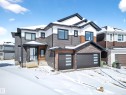 The property features a contemporary exterior with multi-toned siding and brick accents - 6614 39 Avenue, Beaumont, AB  - Outdoor With Facade 