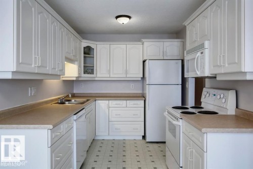10688 Beaumaris Road, Edmonton, AB - Indoor Photo Showing Kitchen With Double Sink