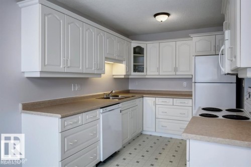 10688 Beaumaris Road, Edmonton, AB - Indoor Photo Showing Kitchen With Double Sink