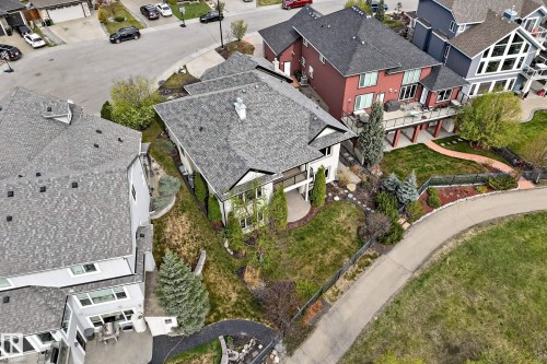 White exterior residence featuring a multi-level roofline with grey shingles - 527 Callaghan Point(E), Edmonton, AB - Outdoor