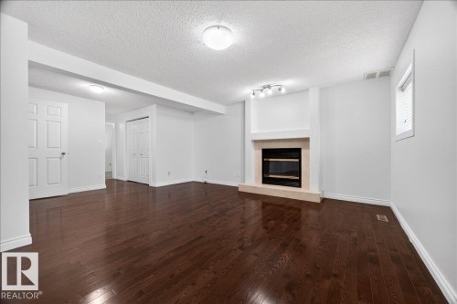 3671 33 Street, Edmonton, AB - Indoor With Fireplace