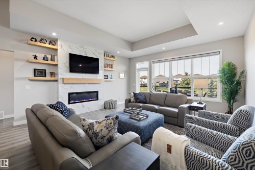 166 Edgewater Circle, Leduc, AB - Indoor Photo Showing Living Room With Fireplace