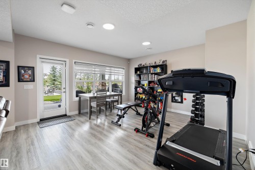 166 Edgewater Circle, Leduc, AB - Indoor Photo Showing Gym Room