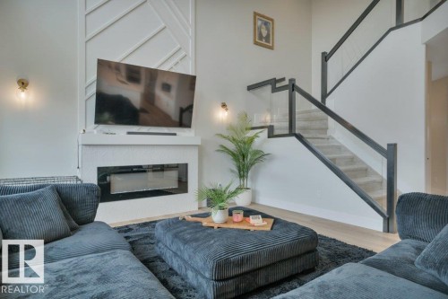 38 Avonlea Way, Spruce Grove, AB - Indoor Photo Showing Living Room With Fireplace