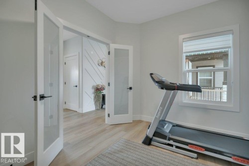 38 Avonlea Way, Spruce Grove, AB - Indoor Photo Showing Gym Room
