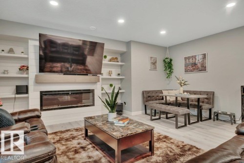 38 Avonlea Way, Spruce Grove, AB - Indoor Photo Showing Living Room With Fireplace
