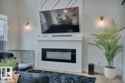 38 Avonlea Way, Spruce Grove, AB - Indoor Photo Showing Living Room With Fireplace