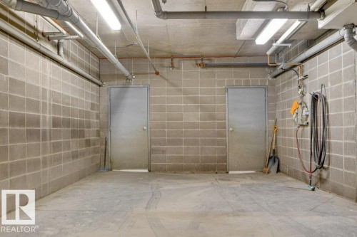 Car wash! - 223 10121 80 Avenue, Edmonton, AB - Indoor Photo Showing Garage