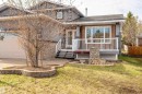 Two-story residence featuring a brick and grey siding exterior - 3917 52 Avenue, Cold Lake, AB  - Outdoor With Deck Patio Veranda 
