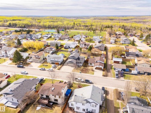 Aerial perspective showcasing a residential neighborhood with diverse housing styles - 3917 52 Avenue, Cold Lake, AB - Outdoor With View