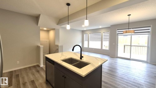 5120 23 Avenue, Edmonton, AB - Indoor Photo Showing Kitchen With Double Sink
