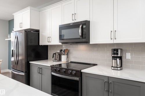 1330 Enright Landing, Edmonton, AB - Indoor Photo Showing Kitchen With Stainless Steel Kitchen