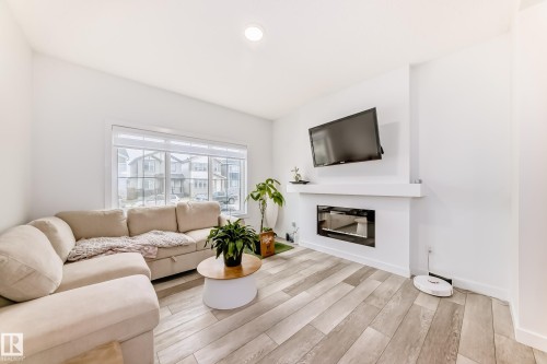6620 46 Avenue, Beaumont, AB - Indoor Photo Showing Living Room With Fireplace