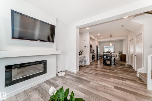 6620 46 Avenue, Beaumont, AB - Indoor Photo Showing Living Room With Fireplace