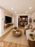 Open-concept living space featuring wood-finish flooring and recessed ceiling lighting - 224 Callingwood Two Two, Edmonton, AB  - Indoor Photo Showing Living Room 
