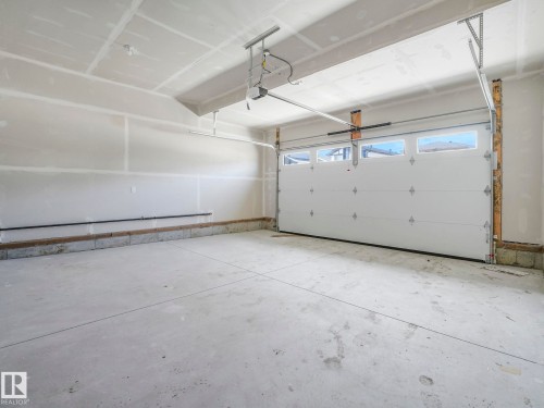 11 Dalquist Bay, Leduc, AB - Indoor Photo Showing Garage