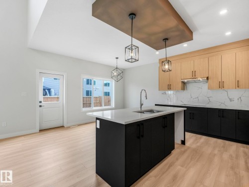 11 Dalquist Bay, Leduc, AB - Indoor Photo Showing Kitchen With Double Sink
