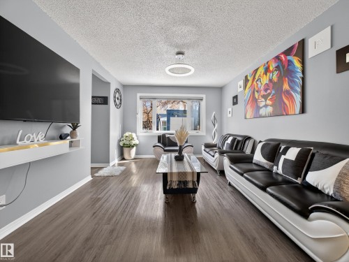 18F Callingwood Court, Edmonton, AB - Indoor Photo Showing Living Room