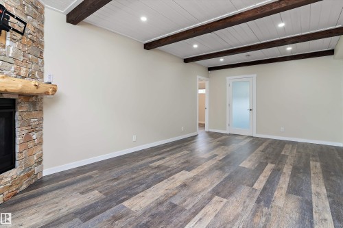 231 Greenfield Way, Fort Saskatchewan, AB - Indoor Photo Showing Other Room With Fireplace