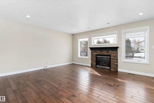 231 Greenfield Way, Fort Saskatchewan, AB - Indoor Photo Showing Living Room With Fireplace
