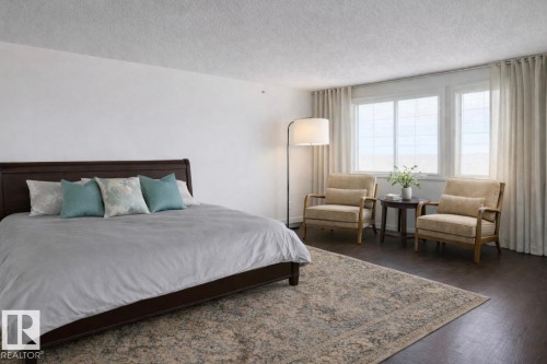 Virtually staged loft - 509 7905 96 Street, Edmonton, AB - Indoor Photo Showing Bedroom