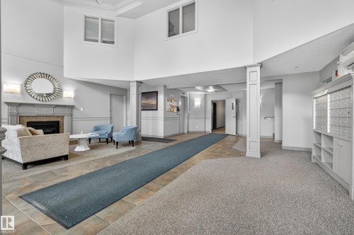 509 7905 96 Street, Edmonton, AB - Indoor Photo Showing Other Room With Fireplace