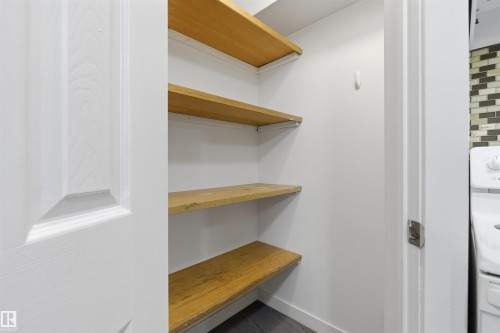 Corner pantry in basement kitchen - 7604 142 Avenue, Edmonton, AB - Indoor With Storage