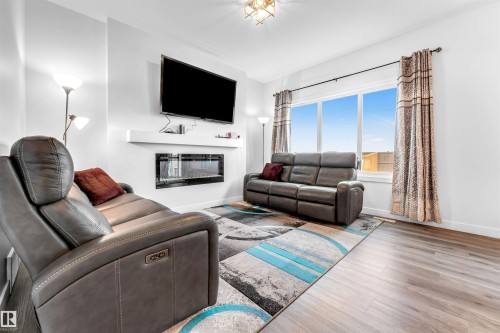 4708 177 Avenue, Edmonton, AB - Indoor Photo Showing Living Room With Fireplace