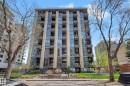 Multi-story residential building with a contemporary facade, featuring vertical window arrangements and individual balconies - 1205 10045 118 Street, Edmonton, AB  - Outdoor With Facade 