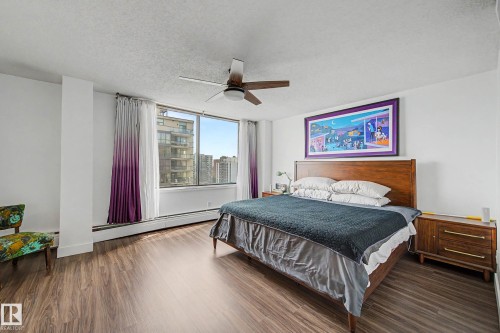 Expansive window offering city and building panoramas - 1205 10045 118 Street, Edmonton, AB - Indoor Photo Showing Bedroom