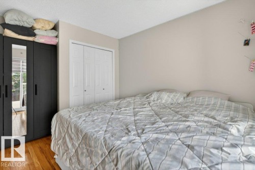 Hardwood-style flooring throughout - 157 Kiniski Crescent, Edmonton, AB - Indoor Photo Showing Bedroom