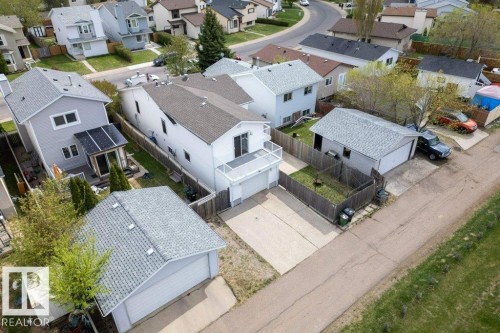 Two-story residence with a white exterior and a second-story balcony - 157 Kiniski Crescent, Edmonton, AB - Outdoor