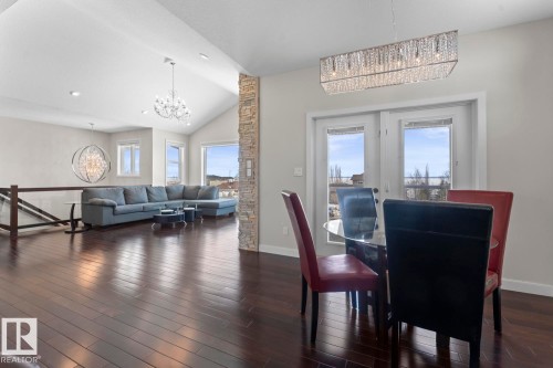 The property features rich hardwood flooring throughout - 1513 Horseshoe Bay Estates, Cold Lake, AB - Indoor Photo Showing Dining Room