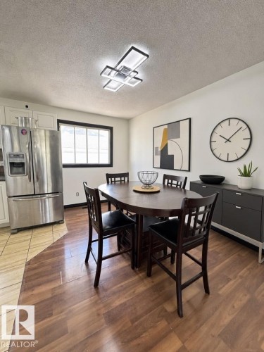Dining area featuring wood-finish flooring - 45 Lambert Crescent, St. Albert, AB - Indoor Photo Showing Dining Room