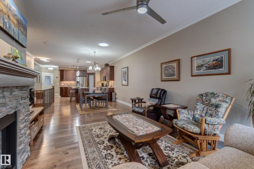 210 50 Heatherglen Drive, Spruce Grove, AB - Indoor Photo Showing Living Room With Fireplace