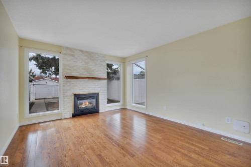 11719 152A Avenue, Edmonton, AB - Indoor Photo Showing Living Room With Fireplace