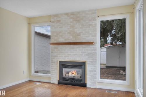 11719 152A Avenue, Edmonton, AB - Indoor Photo Showing Living Room With Fireplace