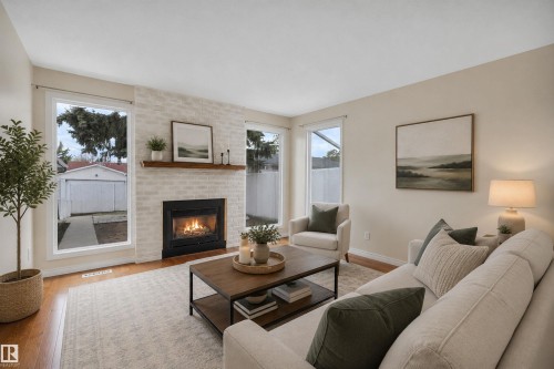 11719 152A Avenue, Edmonton, AB - Indoor Photo Showing Living Room With Fireplace