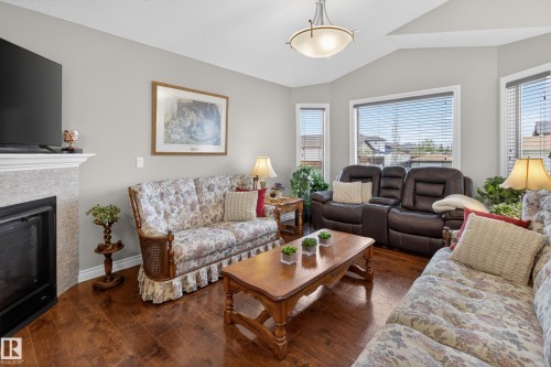 21 Beaverhill View Cr, Tofield, AB - Indoor Photo Showing Living Room With Fireplace
