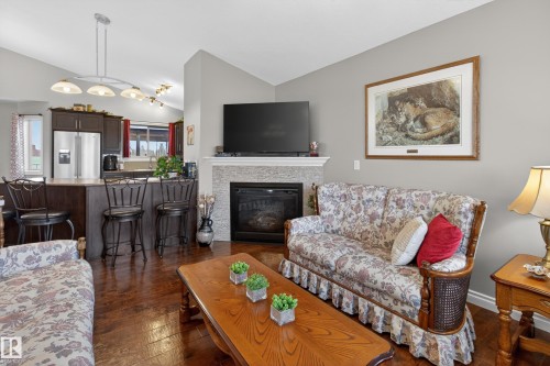 21 Beaverhill View Cr, Tofield, AB - Indoor Photo Showing Living Room With Fireplace