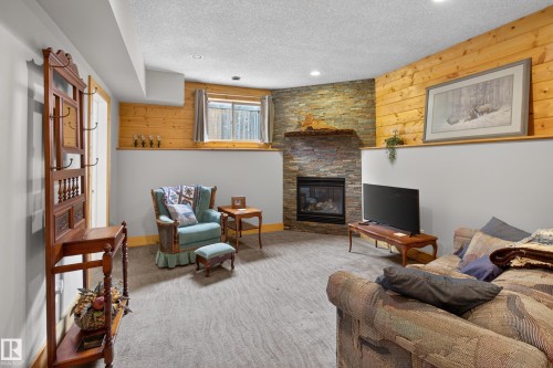 21 Beaverhill View Cr, Tofield, AB - Indoor With Fireplace