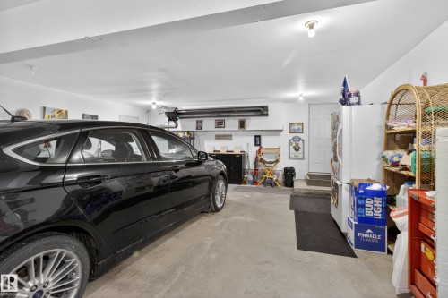 21 Beaverhill View Cr, Tofield, AB - Indoor Photo Showing Garage