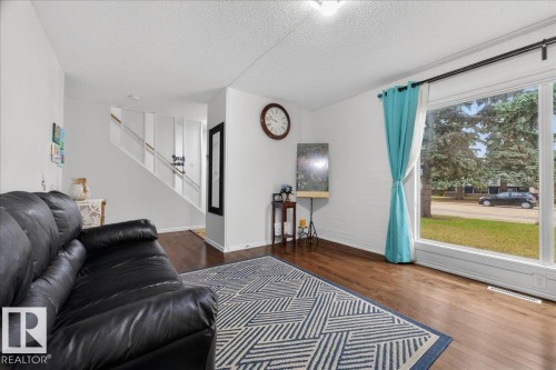 4124 121 Street, Edmonton, AB - Indoor Photo Showing Living Room